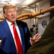 Illustration for article titled ‘Let Them Have Eric,’ Screams Trump While Pushing Son Through Door Of Bunker